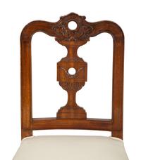 A Set of Eight Italian Walnut Dining Chairs