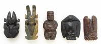 A Group of Five Carved Hardstone Toggles Height of tallest 3 1/8 inches.