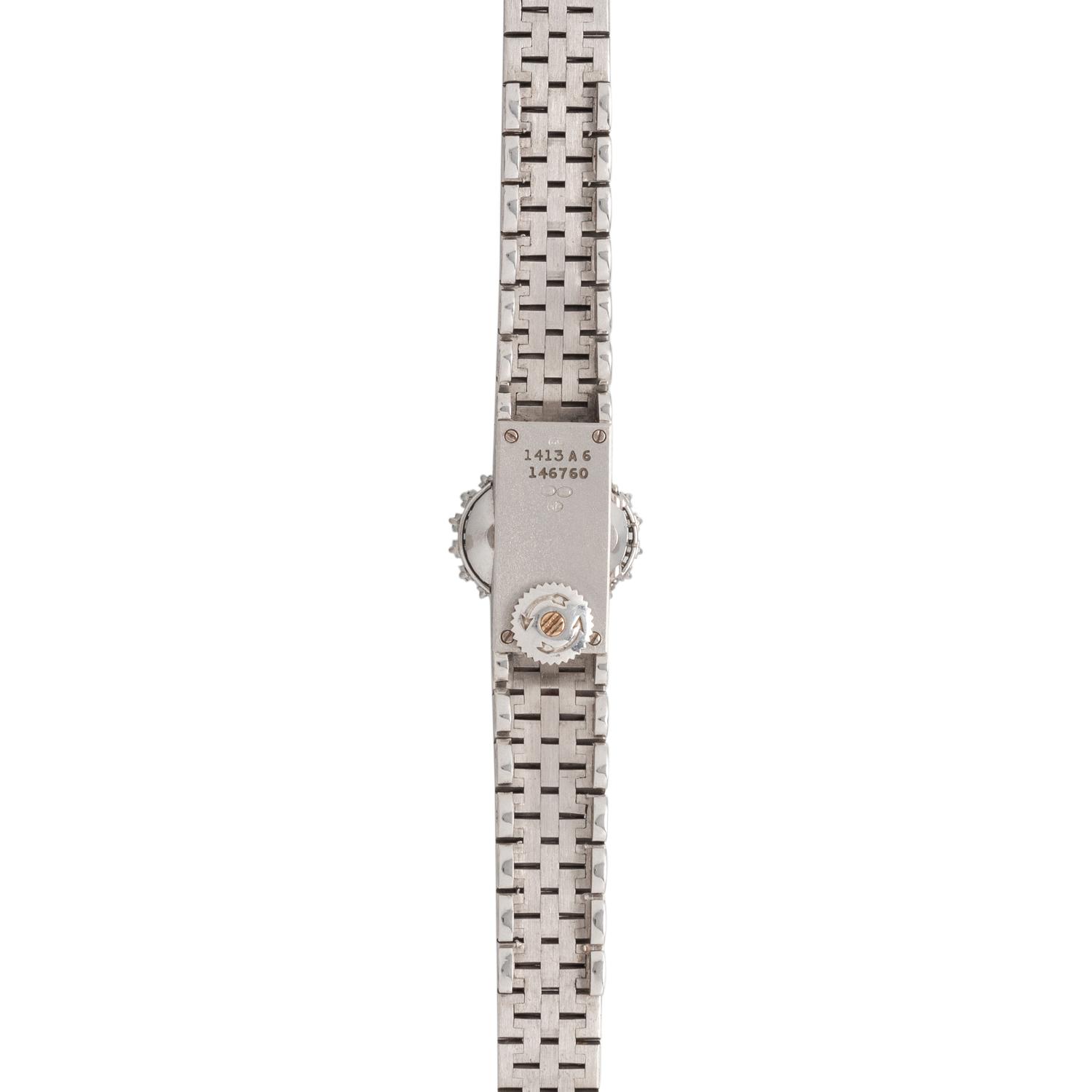 PIAGET, 18K WHITE GOLD, DIAMOND AND SAPPHIRE SURPRISE WATCH