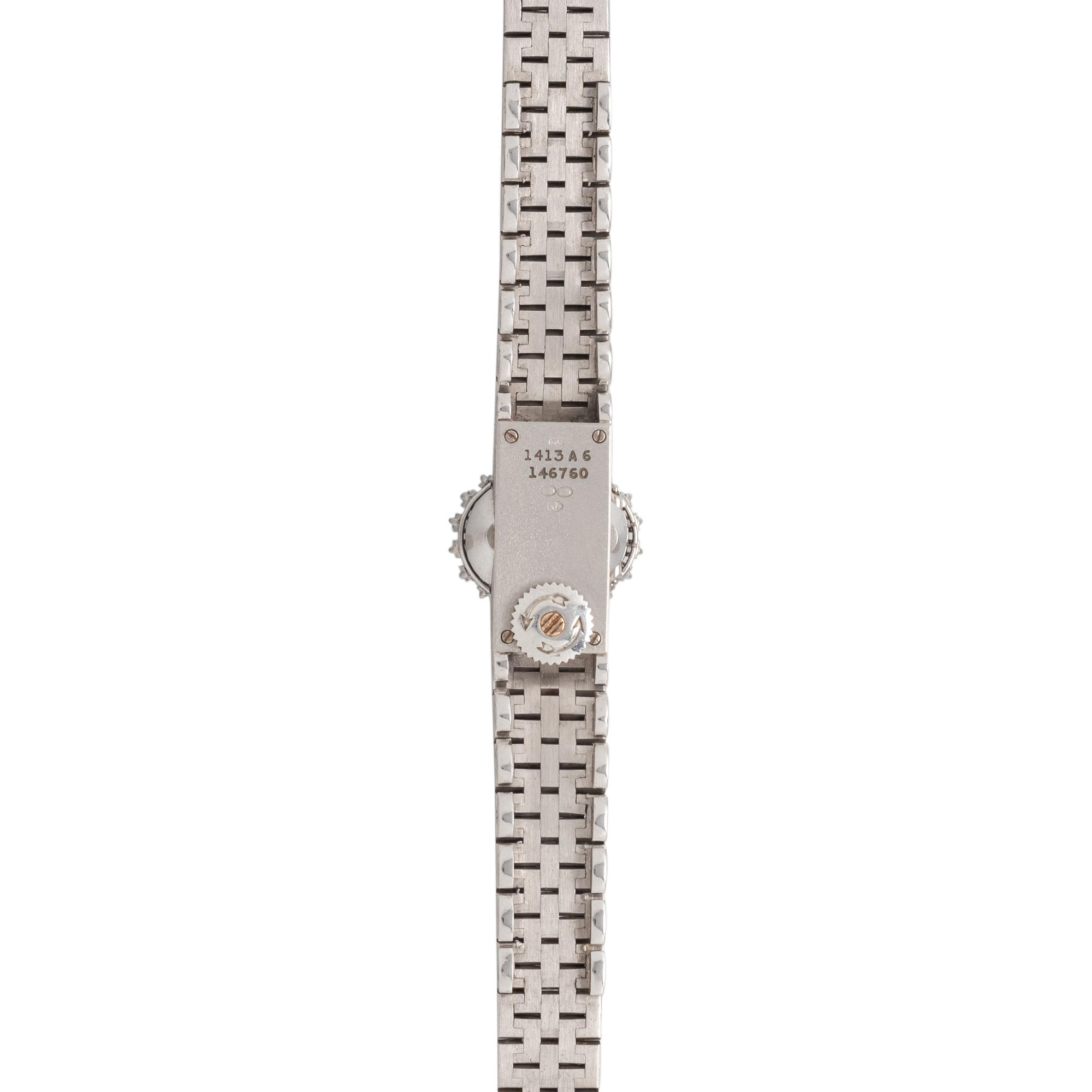 PIAGET, 18K WHITE GOLD, DIAMOND AND SAPPHIRE SURPRISE WATCH