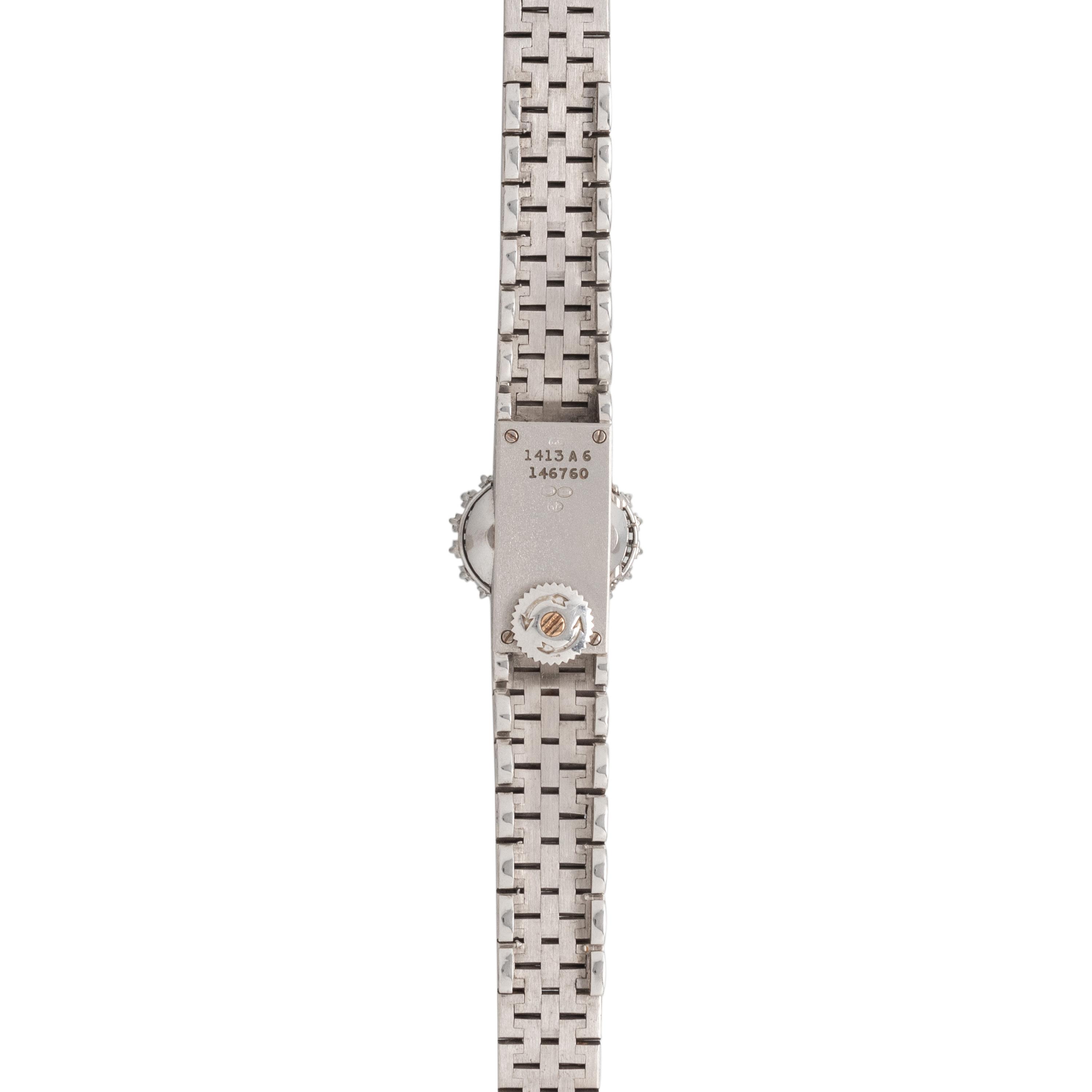 PIAGET, 18K WHITE GOLD, DIAMOND AND SAPPHIRE SURPRISE WATCH