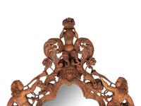 An Italian Carved Walnut Mirror in the Manner of Valentino Besarel