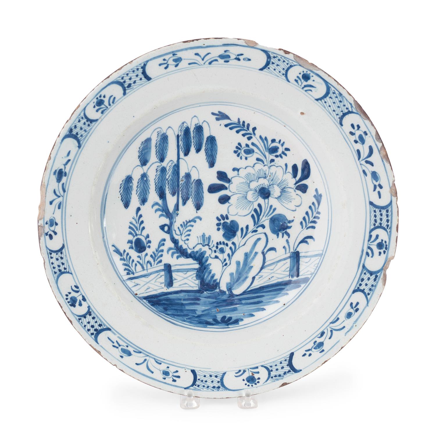 A Dutch Blue and White Glazed Delftware Charger