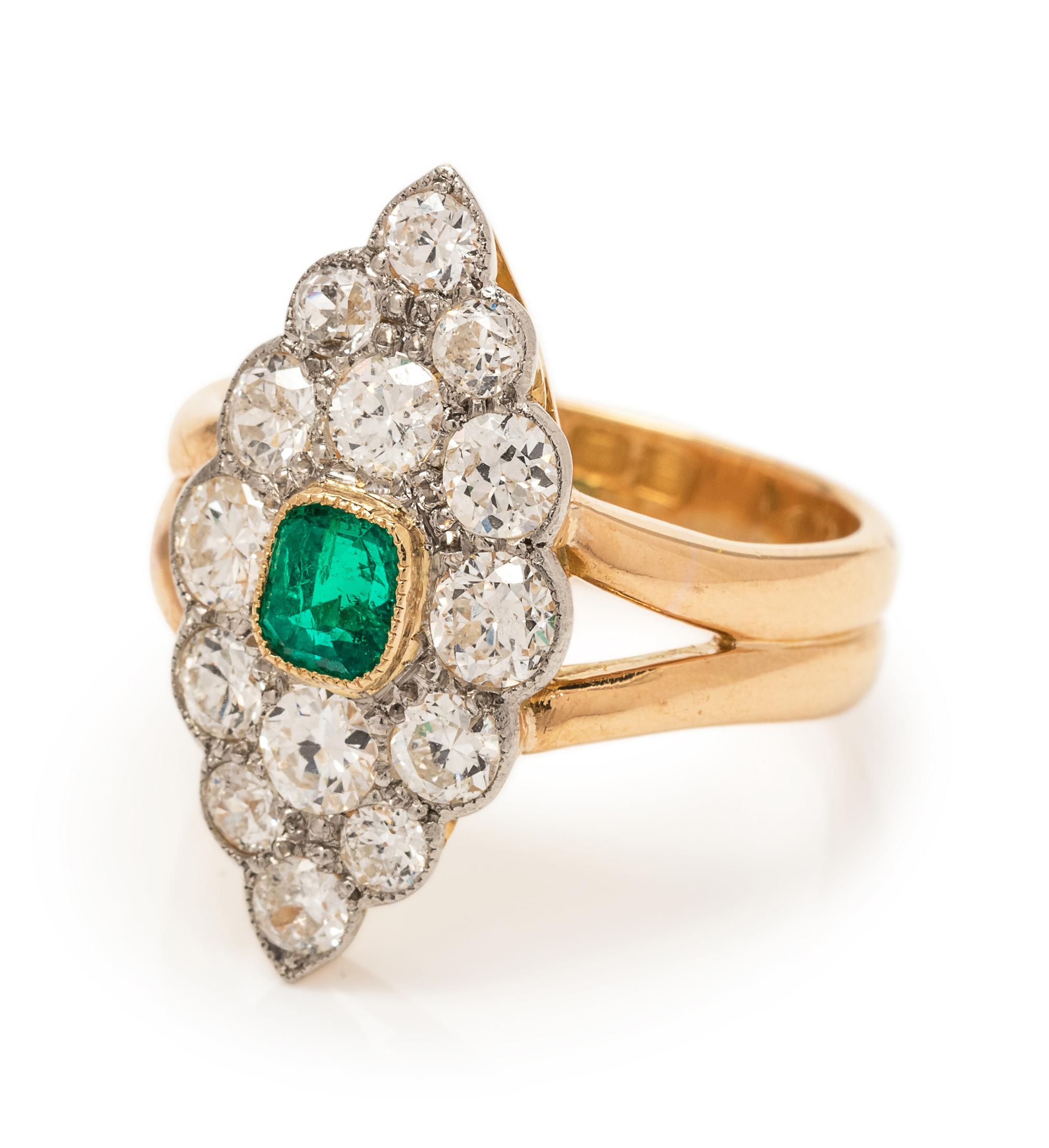 A Platinum Topped 22 Karat Yellow Gold, Emerald and Diamond Ring, British,