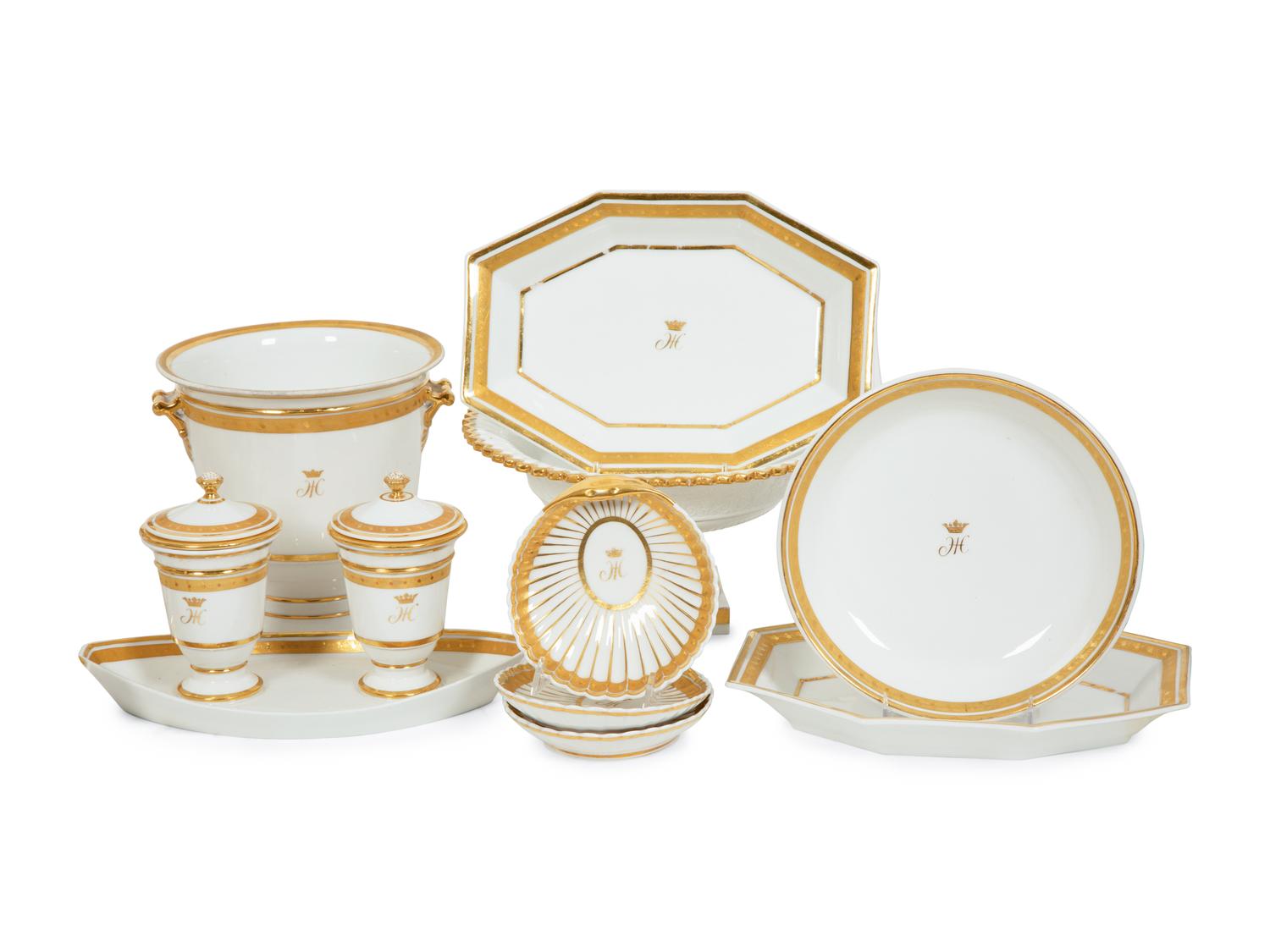 A Continental Gilt Decorated Porcelain Dessert Service