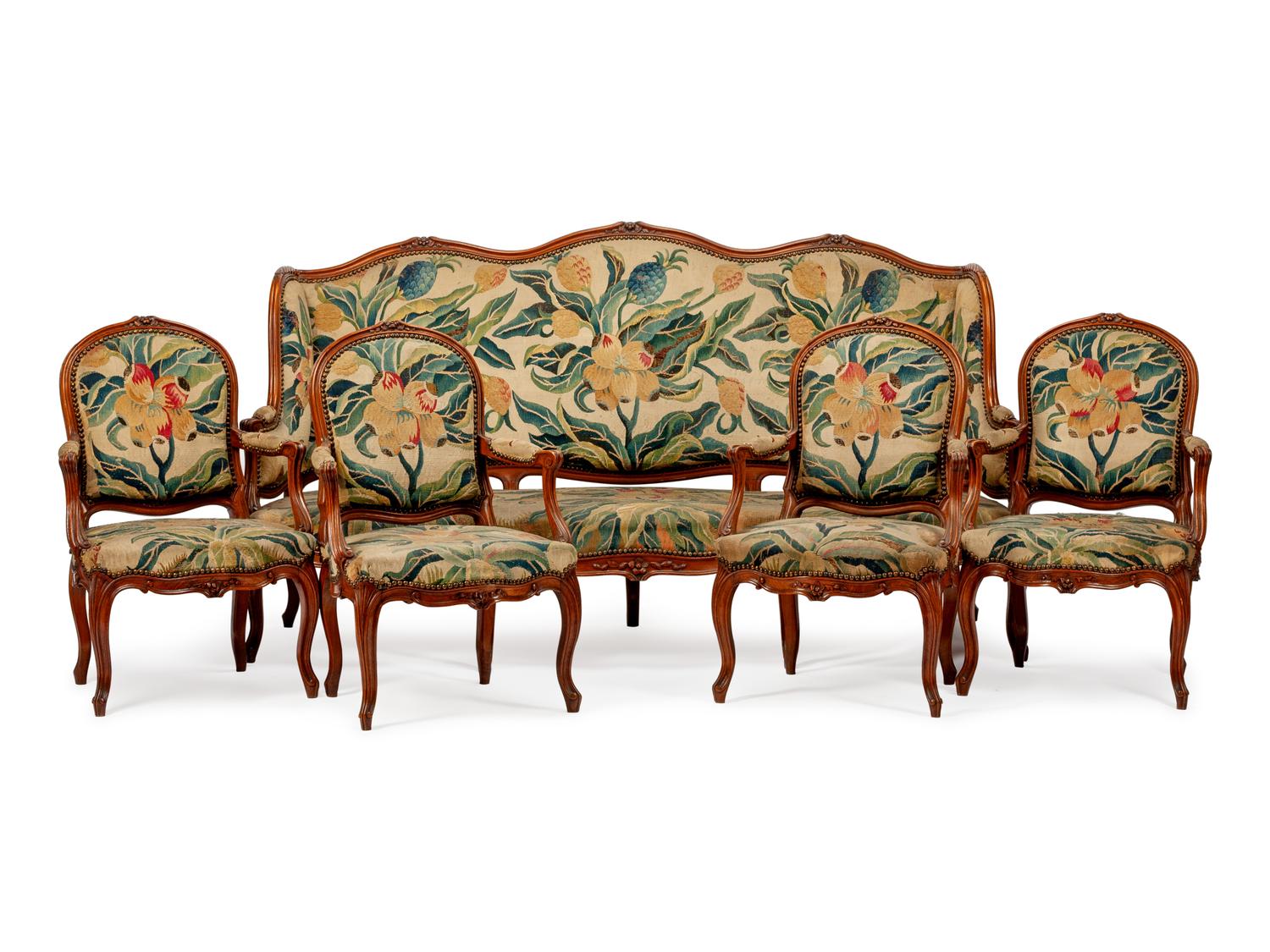 A Louis XV Style Tapestry-Upholstered Five-Piece Carved Walnut Salon Suite