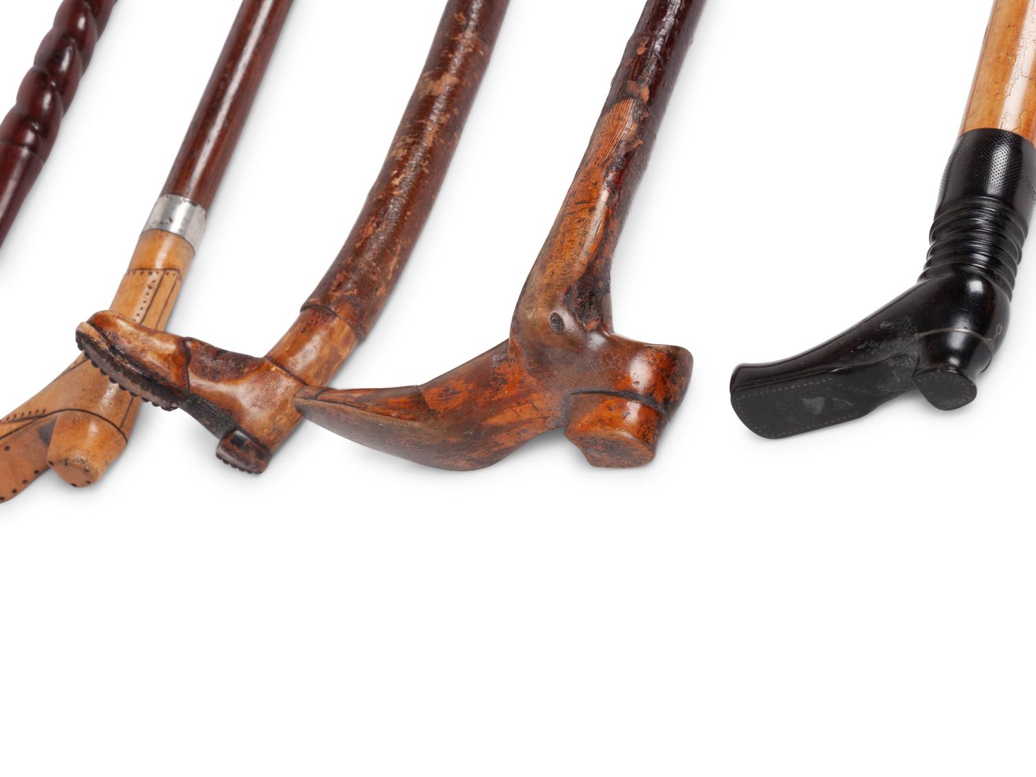 A Group of Folk Art Carved Shoe-Form Canes