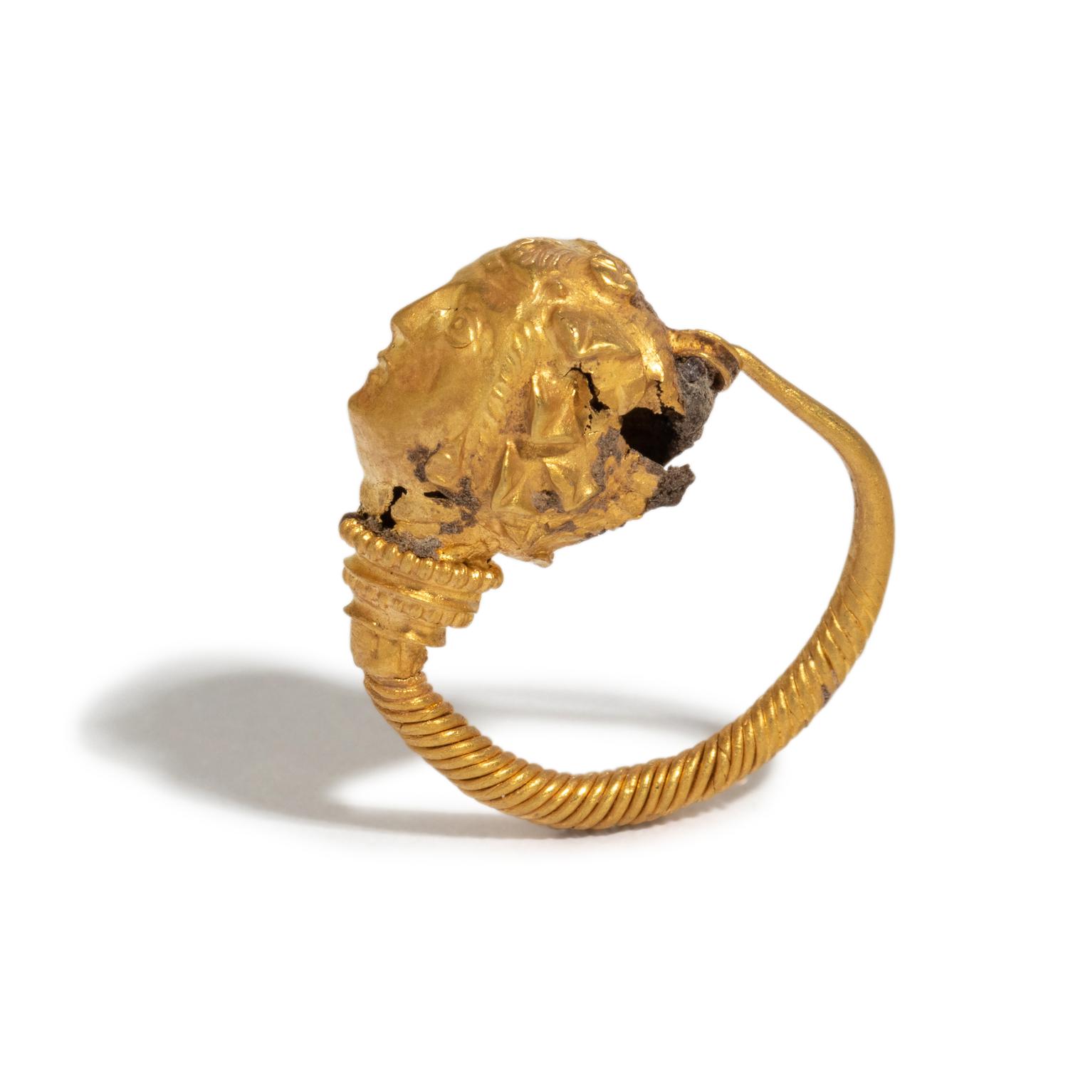 A Greek Gold Hoop Earring with a Maenad-Head Terminal