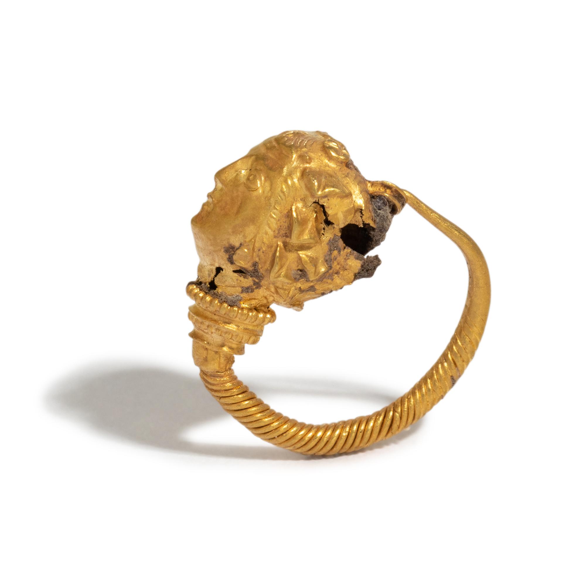 A Greek Gold Hoop Earring with a Maenad-Head Terminal