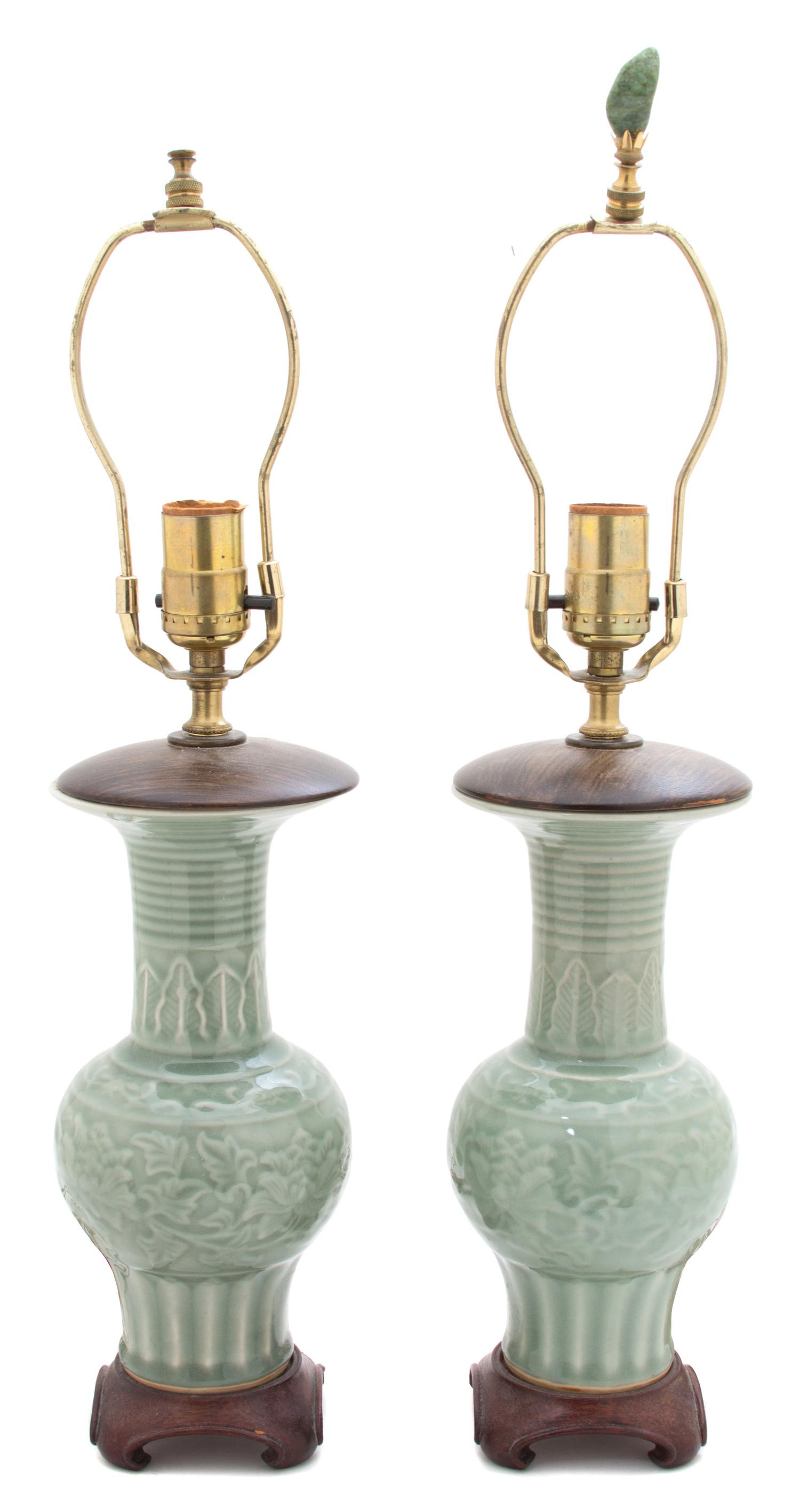 A Pair of Chinese Celadon Glazed Porcelain Height of porcelain 11 3/4 inches. — 19TH CENTURY
