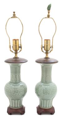 A Pair of Chinese Celadon Glazed Porcelain Height of porcelain 11 3/4 inches. — 19TH CENTURY