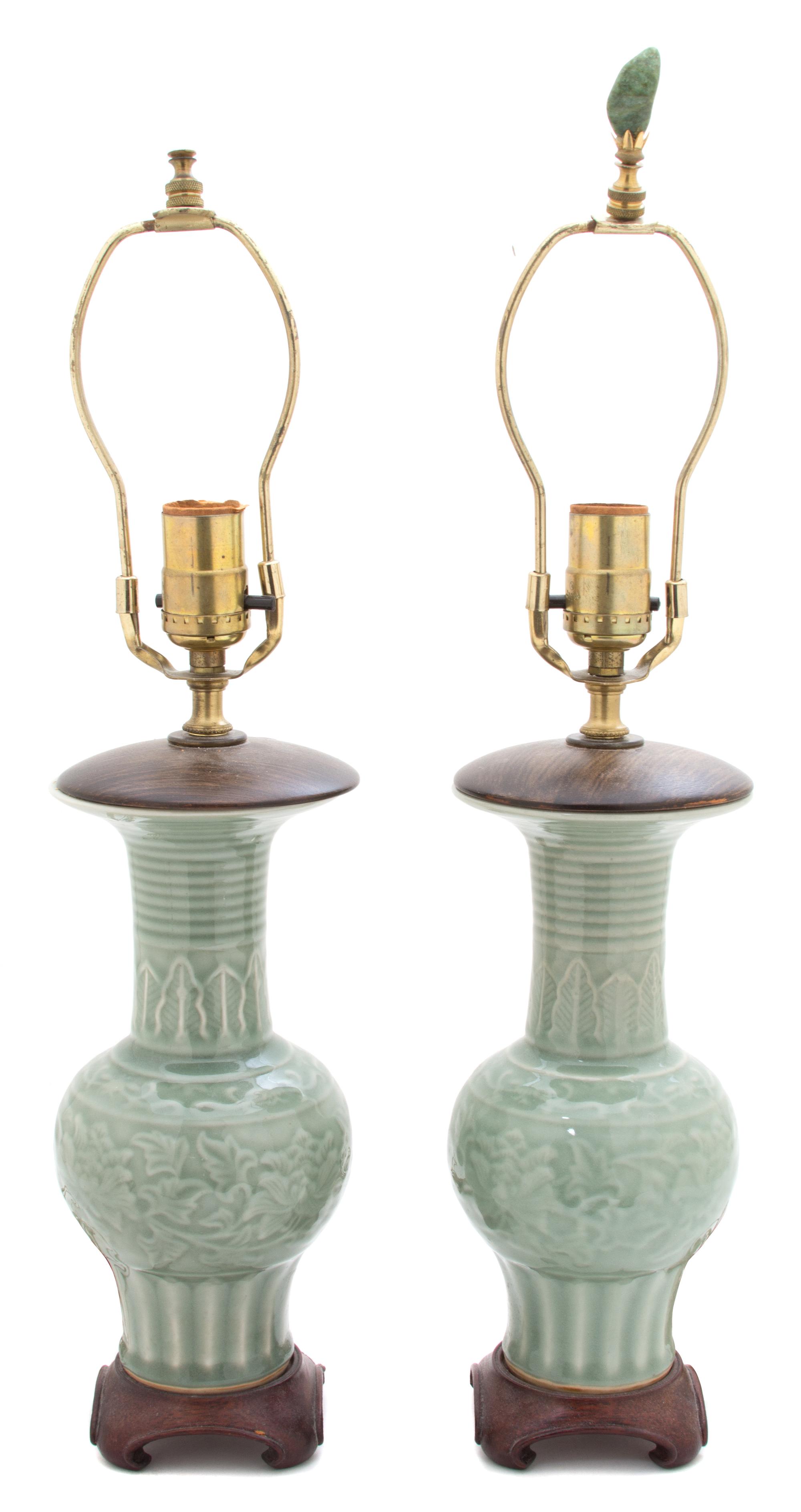 A Pair of Chinese Celadon Glazed Porcelain Height of porcelain 11 3/4 inches. — 19TH CENTURY