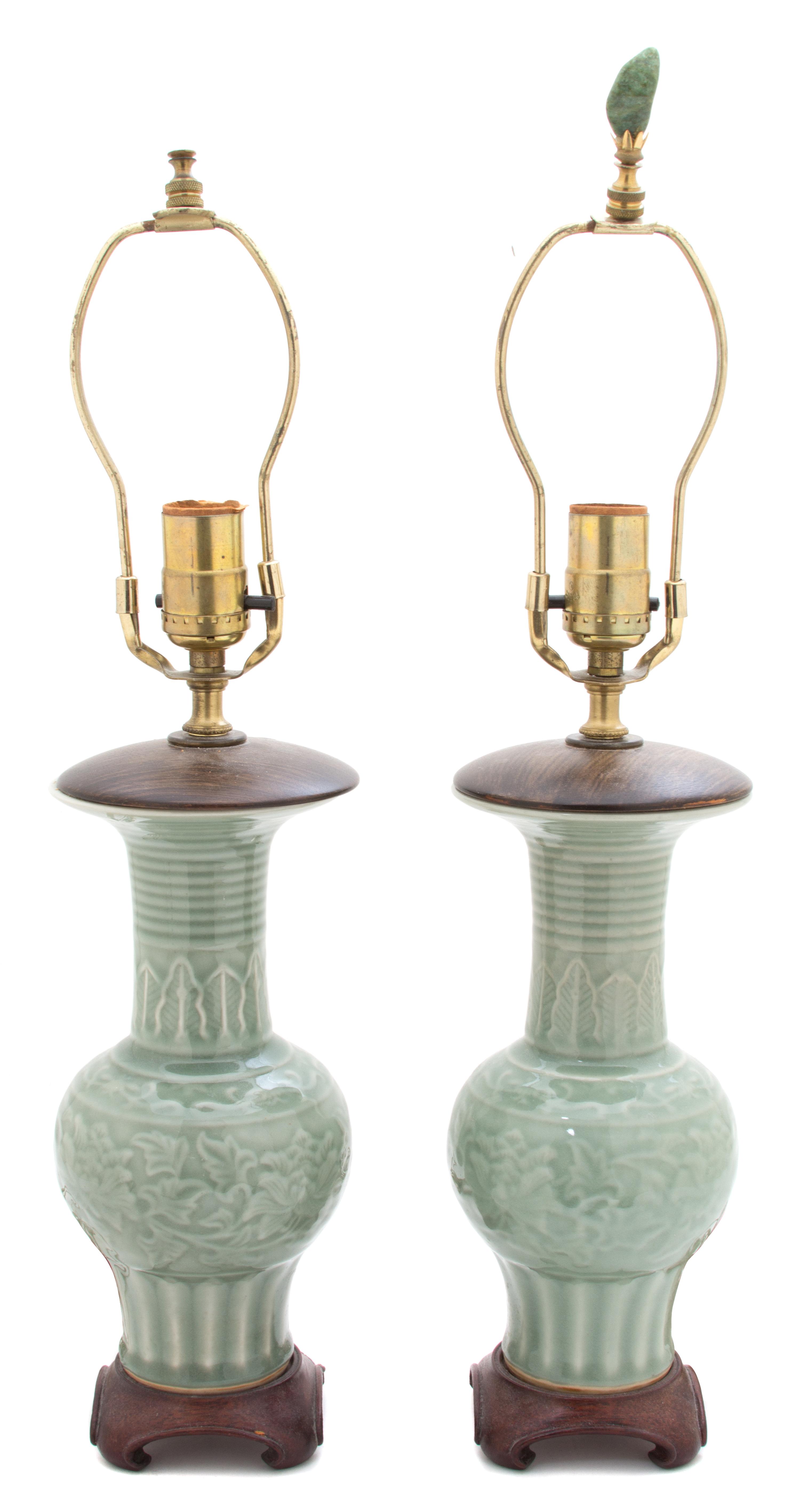 A Pair of Chinese Celadon Glazed Porcelain Height of porcelain 11 3/4 inches. — 19TH CENTURY