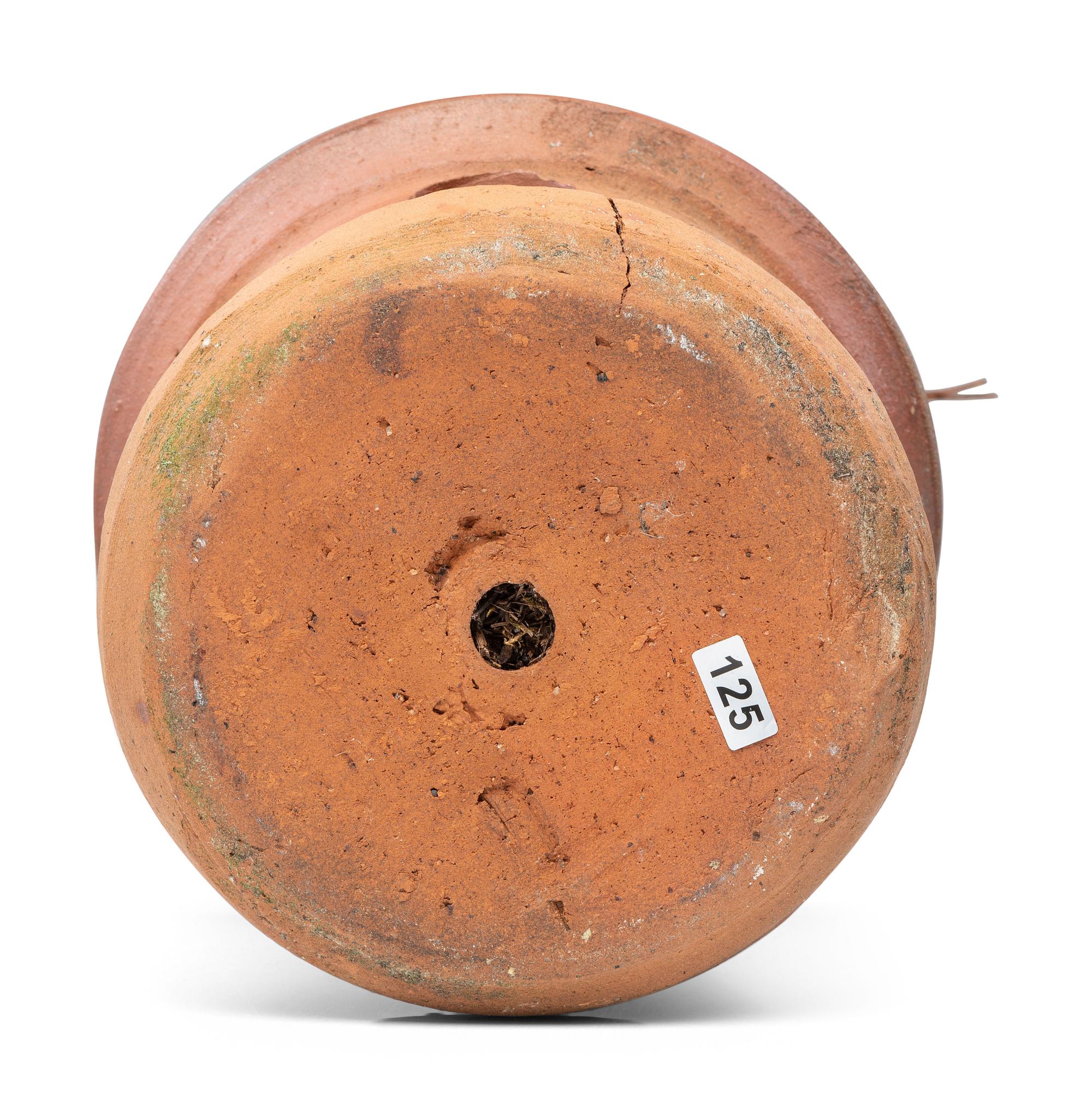 An Incised Sewer Tile Birdhouse