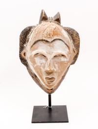 A White Face Mask, Punu (Gabon) Height overall 16 inches. — LATE 19TH CENTURY