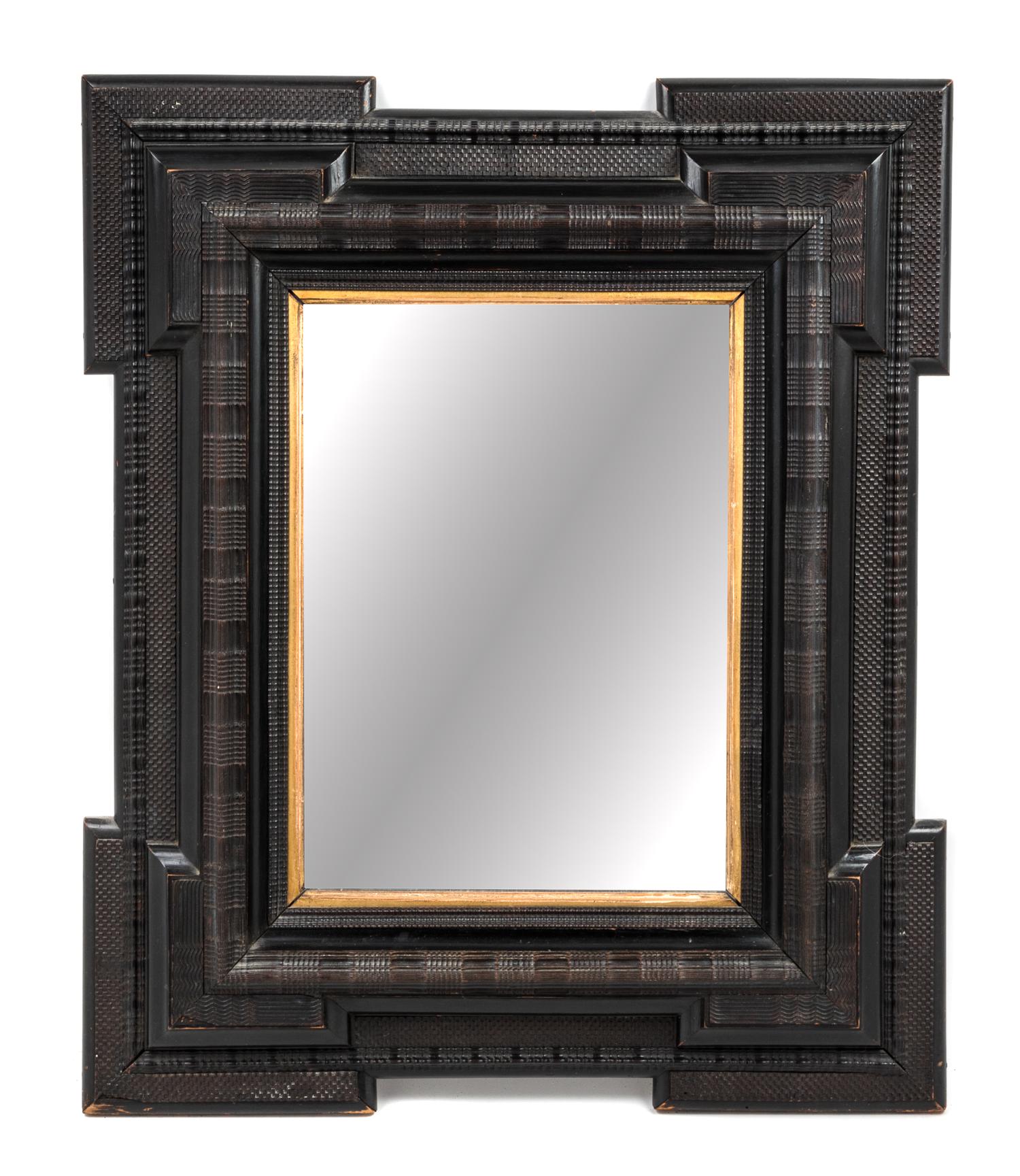 A Flemish or Spanish Ebonized Ribbon Cut Mirror Height 30 3/4 x width 25 1/2 inches. — 19TH CENTURY