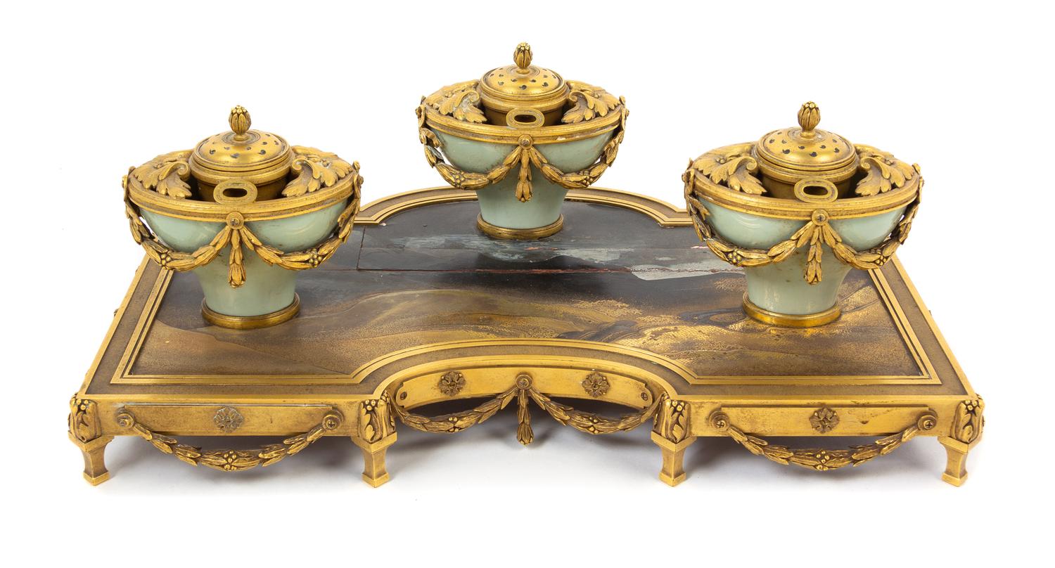 A French Gilt Bronze, Celadon Porcelain and Japanese Lacquer-Inset Encrier Height 6 3/8 x width 16 1/4 inches. — PAUL SORMANI, PARIS, LATE 19TH CENTURY