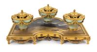 A French Gilt Bronze, Celadon Porcelain and Japanese Lacquer-Inset Encrier Height 6 3/8 x width 16 1/4 inches. — PAUL SORMANI, PARIS, LATE 19TH CENTURY