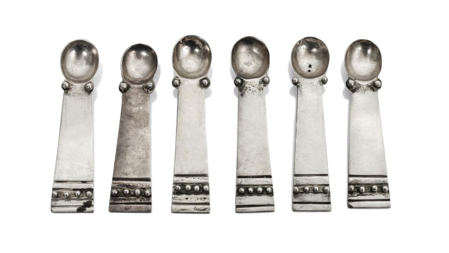 Six Mexican Silver Salt Spoons, William Spratling (1900-1967) Length 2 5/8 inches.