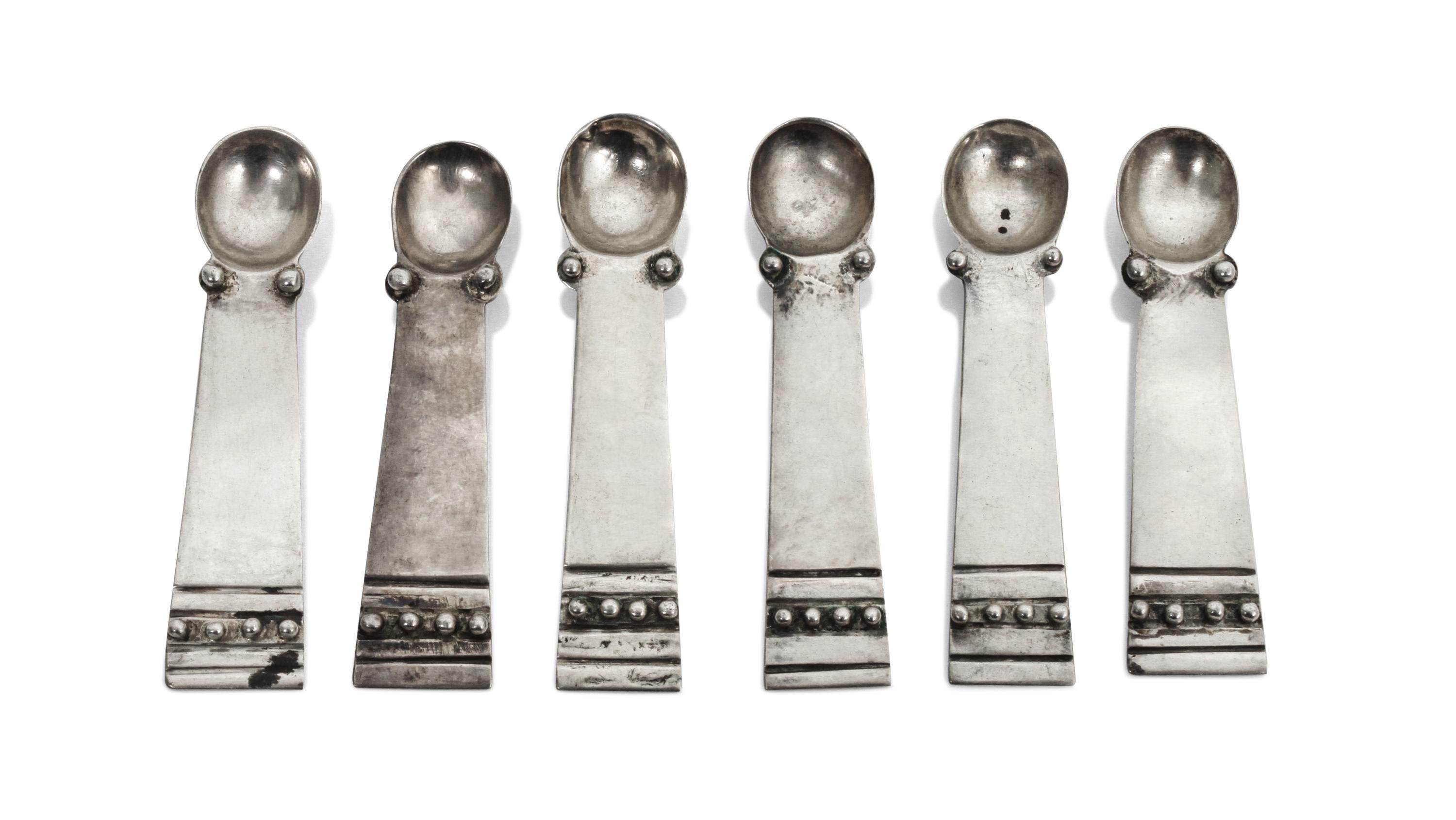 Six Mexican Silver Salt Spoons, William Spratling (1900-1967) Length 2 5/8 inches.