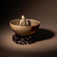 A Rare Yixing Peach-Form 'Figure' Puzzle Cup with Impressed Seals 'Chen', 'Mingyuan' and Wood Stand 陳鳴遠款醉翁桃形公道杯