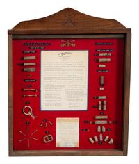 [LATE INDIAN WARS]. Little Bighorn Battlefield relics, incl. shells, buckles, and bullets, found by Bob and Donella Johnson in 1981.