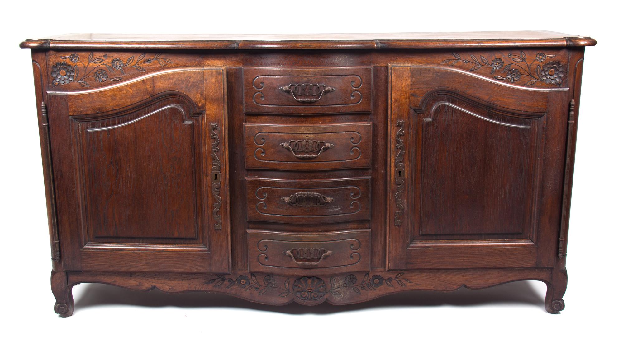A Louis XV Provincial Style Oak Server Height 42 x width 79 x depth 21 inches. — 19TH CENTURY