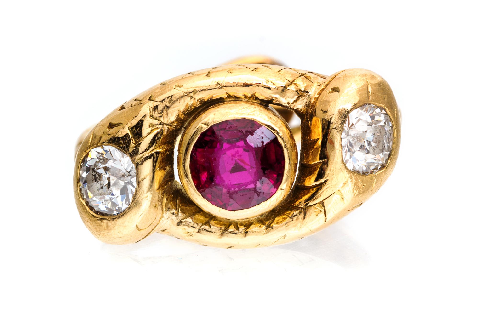 A Victorian Yellow Gold, Ruby and Diamond Twin Snake Ring, 5.40 dwts.