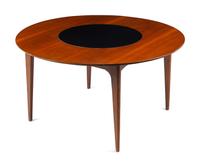 A Modernist Walnut Round Table