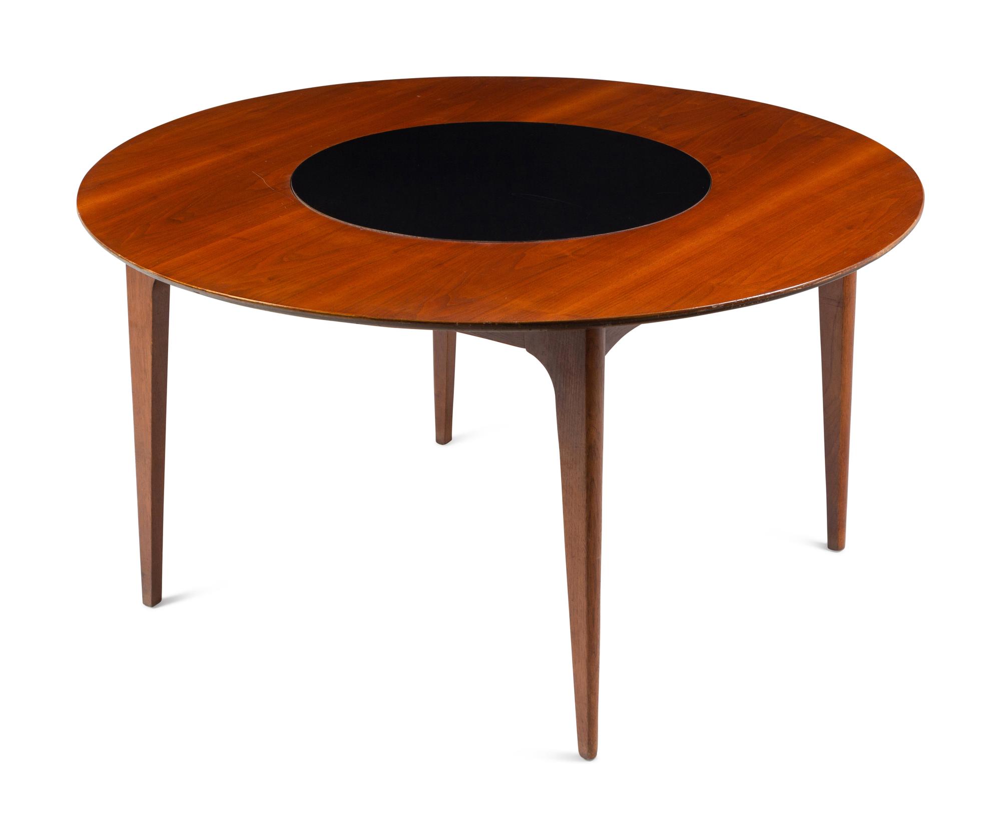 A Modernist Walnut Round Table