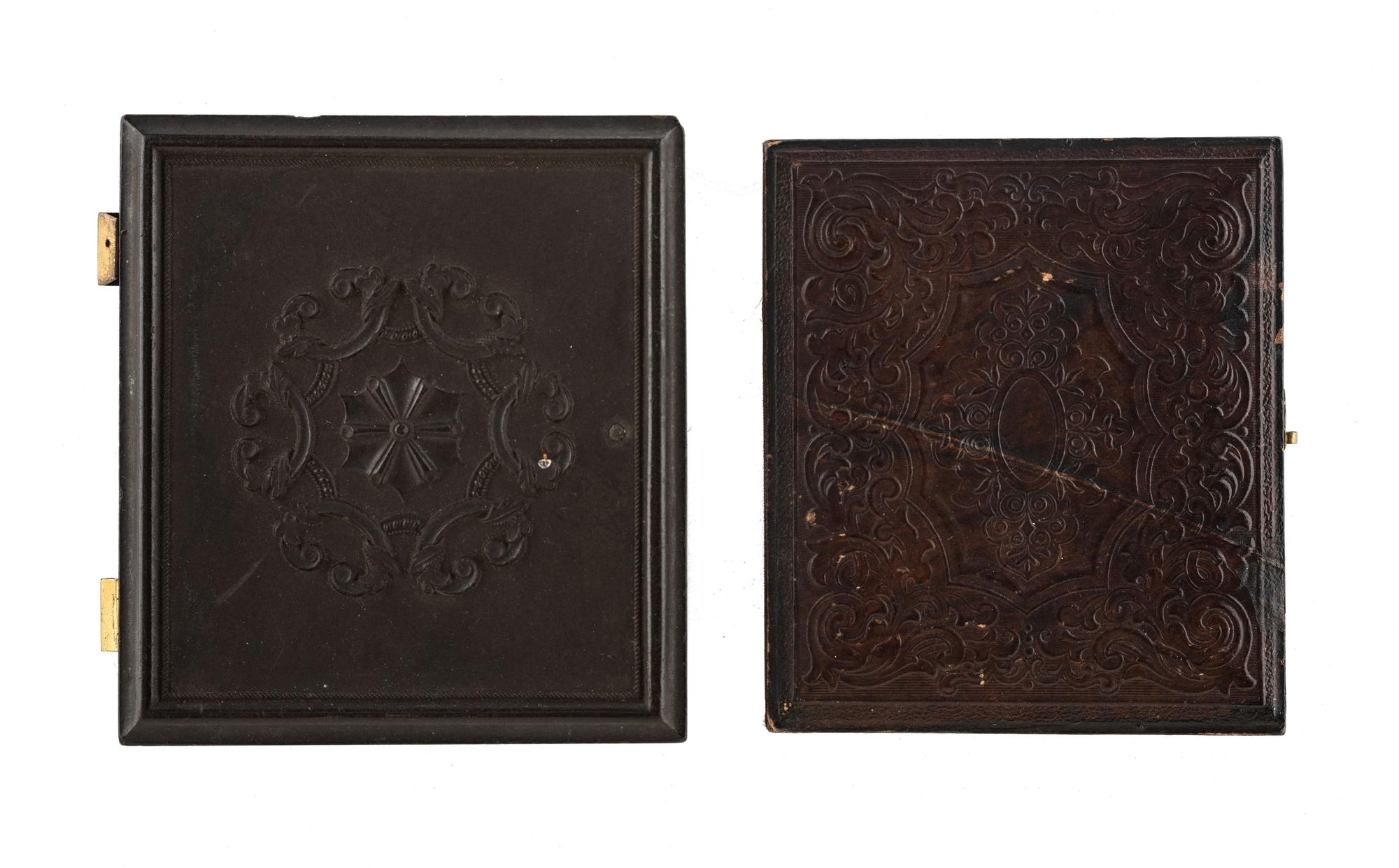 [EARLY PHOTOGRAPHY - PORTRAITURE]. A pair of daguerreotype portraits of mixed race subjects.