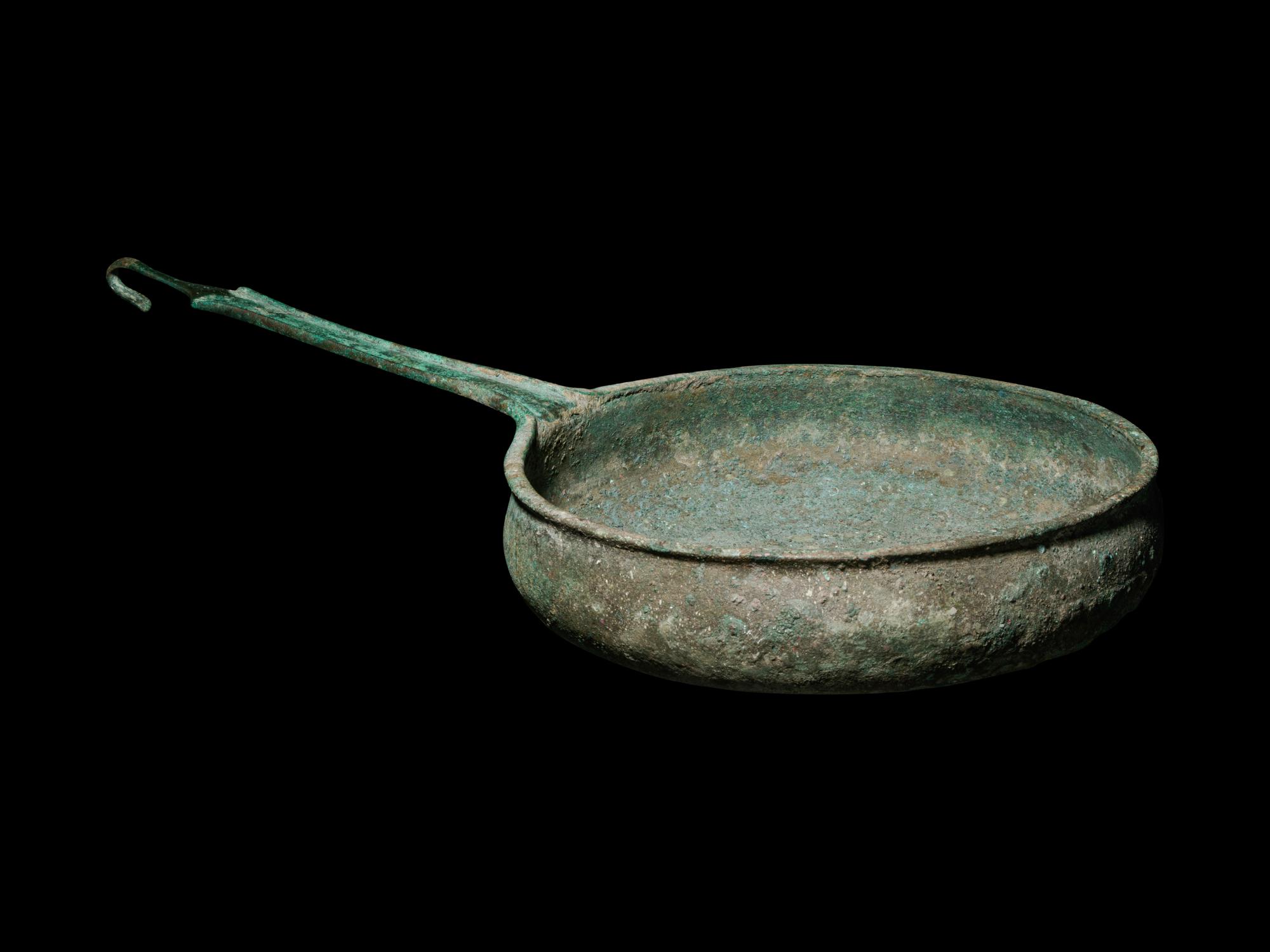 A South Italian Bronze Patera with Strap Handle