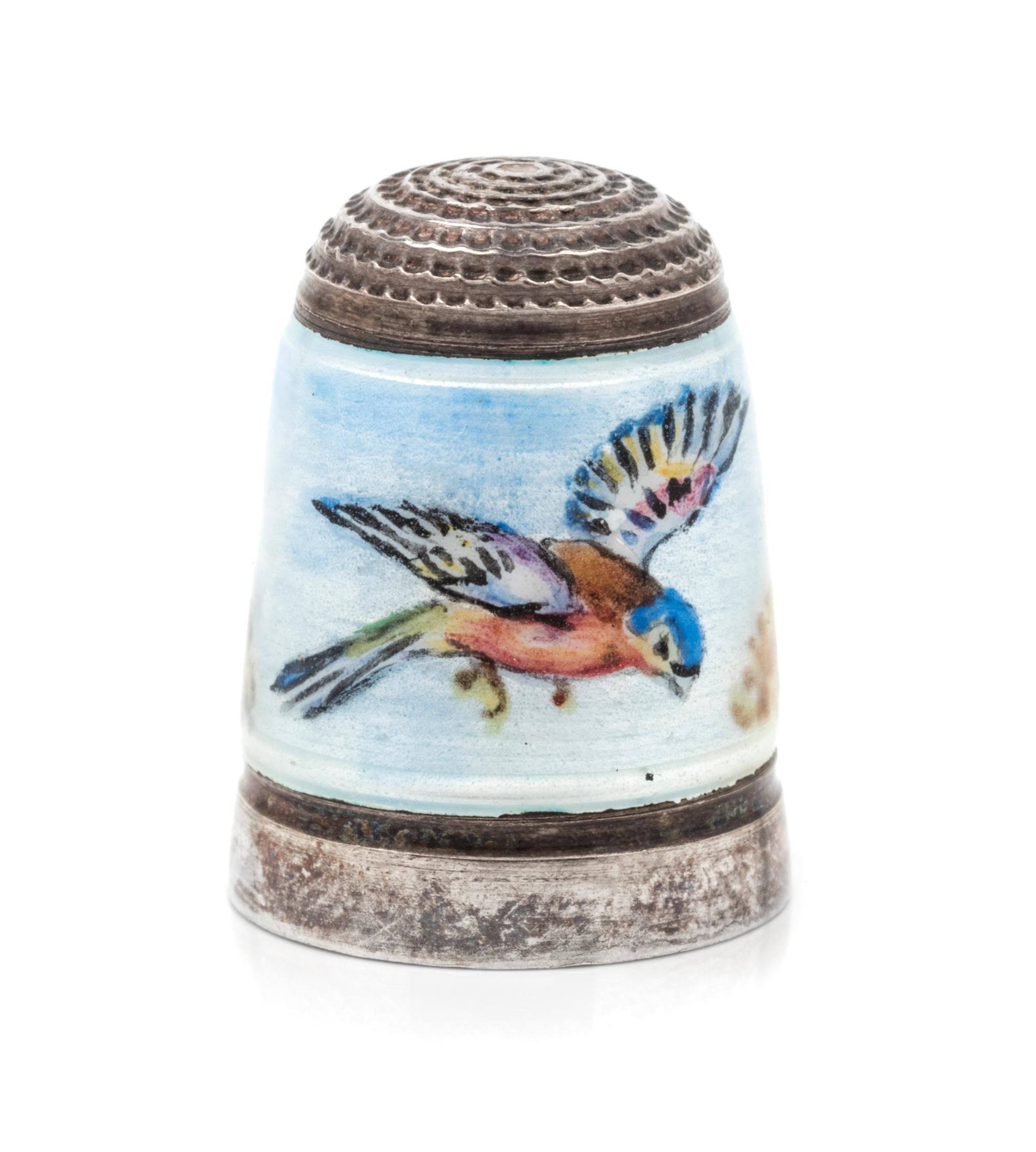 An English Silver and Enamel Thimble, Joseph Swan & Sons, Birmingham, 1972, the knurled top above a polychrome enamel band depicting a