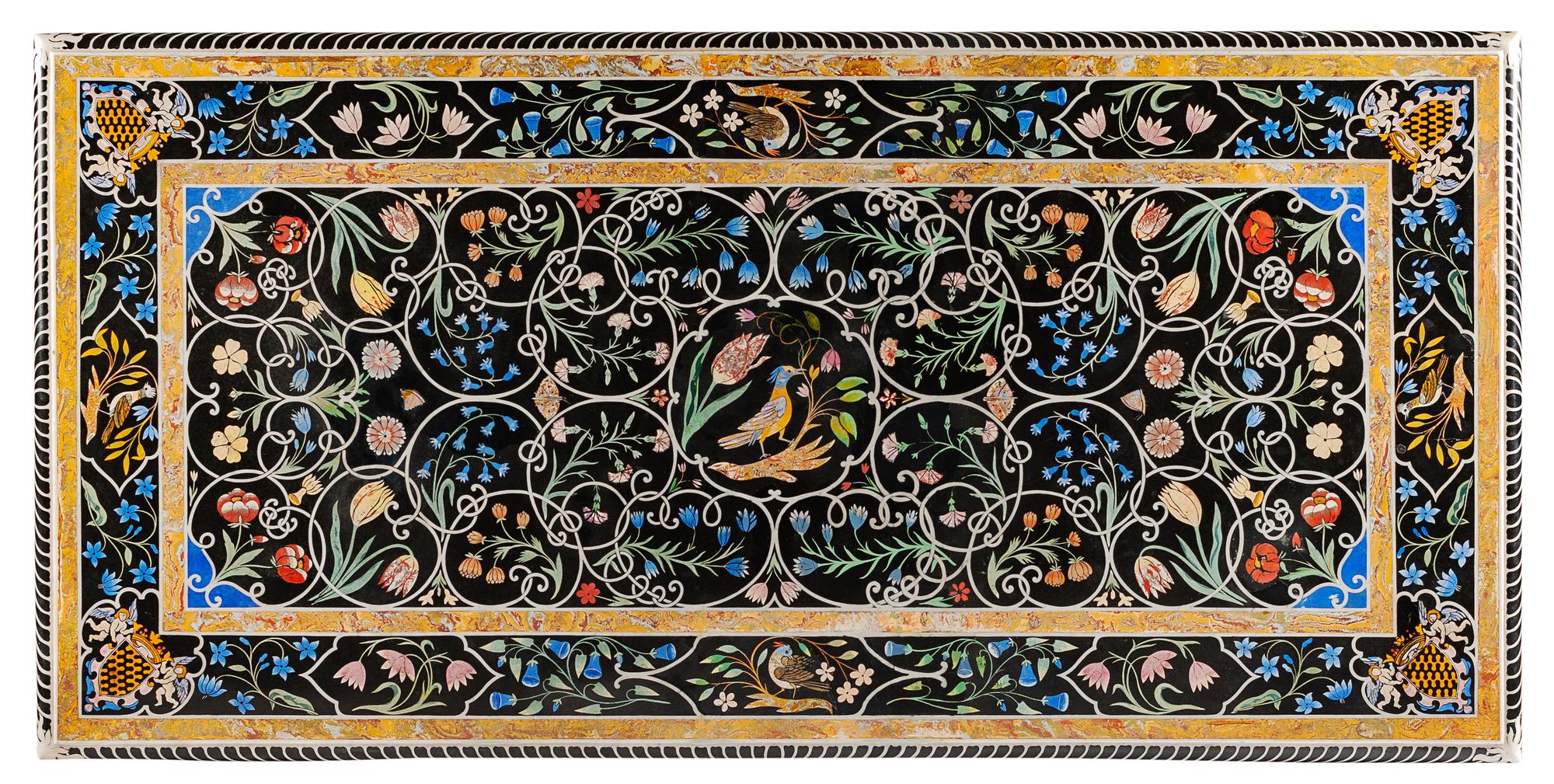 An Italian Pietra Dura Center Table Height 31 x length 77 1/2 x depth 38 inches.