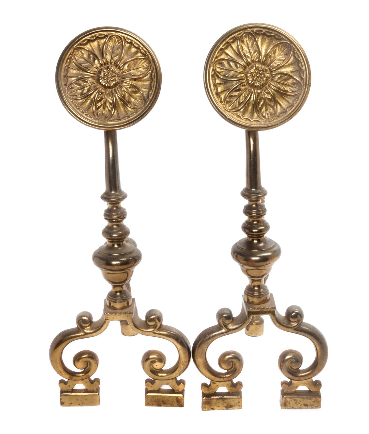 A Pair of Arts and Crafts Brass Andirons Height 18 1/4 inches.