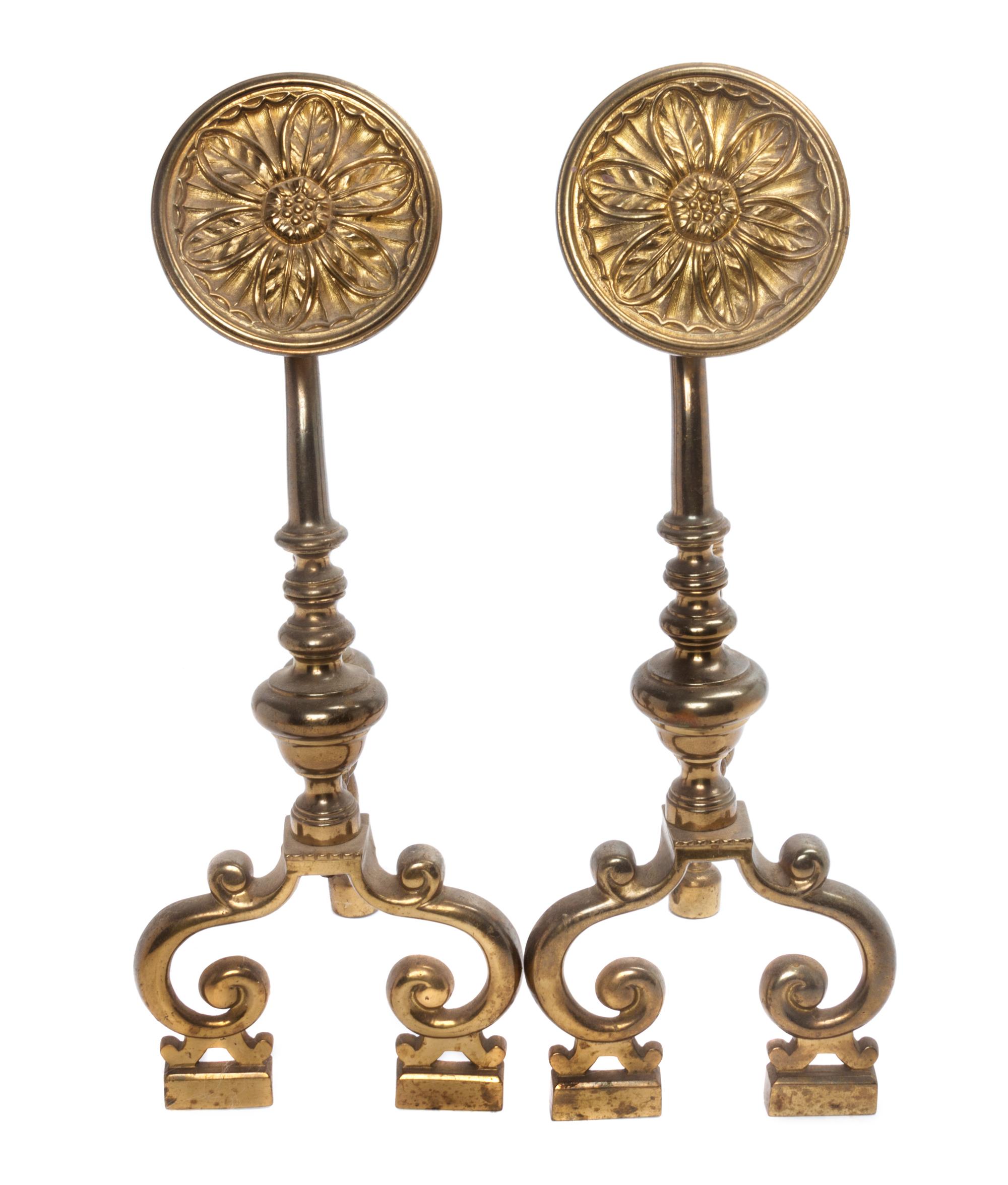 A Pair of Arts and Crafts Brass Andirons Height 18 1/4 inches.
