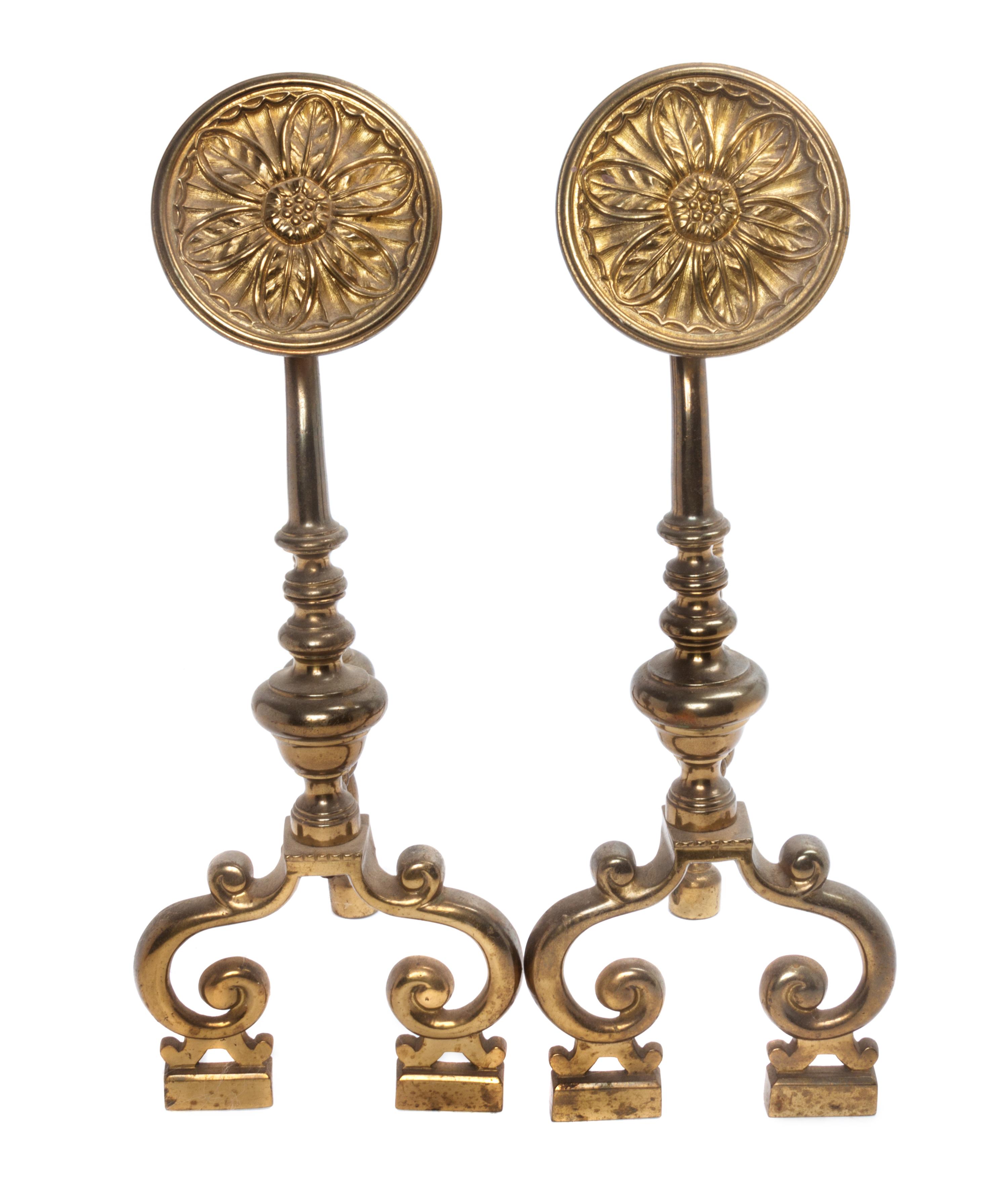 A Pair of Arts and Crafts Brass Andirons Height 18 1/4 inches.