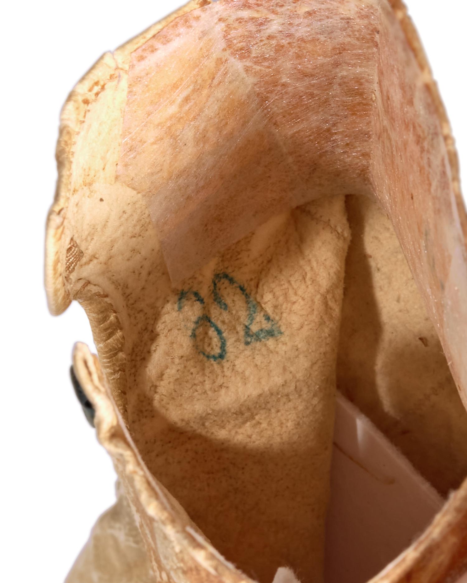 [LINCOLN ASSASSINATION]. A pair of stained leather gloves carried by President Abraham Lincoln at Ford's Theatre on the night of his assassination, 14 April 1865.