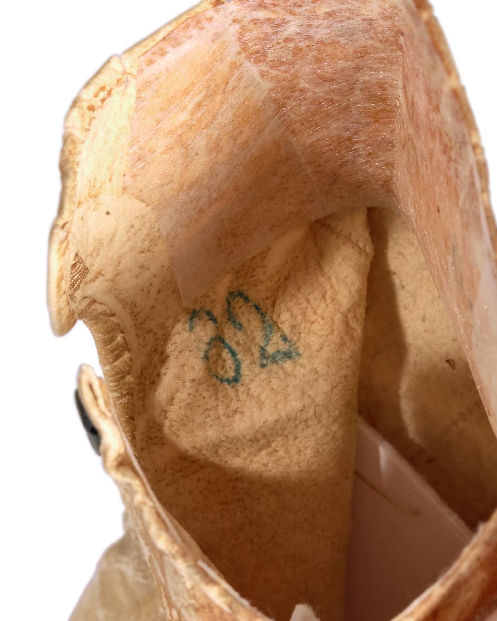 [LINCOLN ASSASSINATION]. A pair of stained leather gloves carried by President Abraham Lincoln at Ford's Theatre on the night of his assassination, 14 April 1865. 