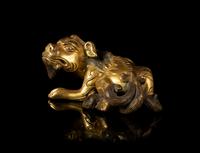 A Gilt Bronze Mythical Beast-Form Paper Weight