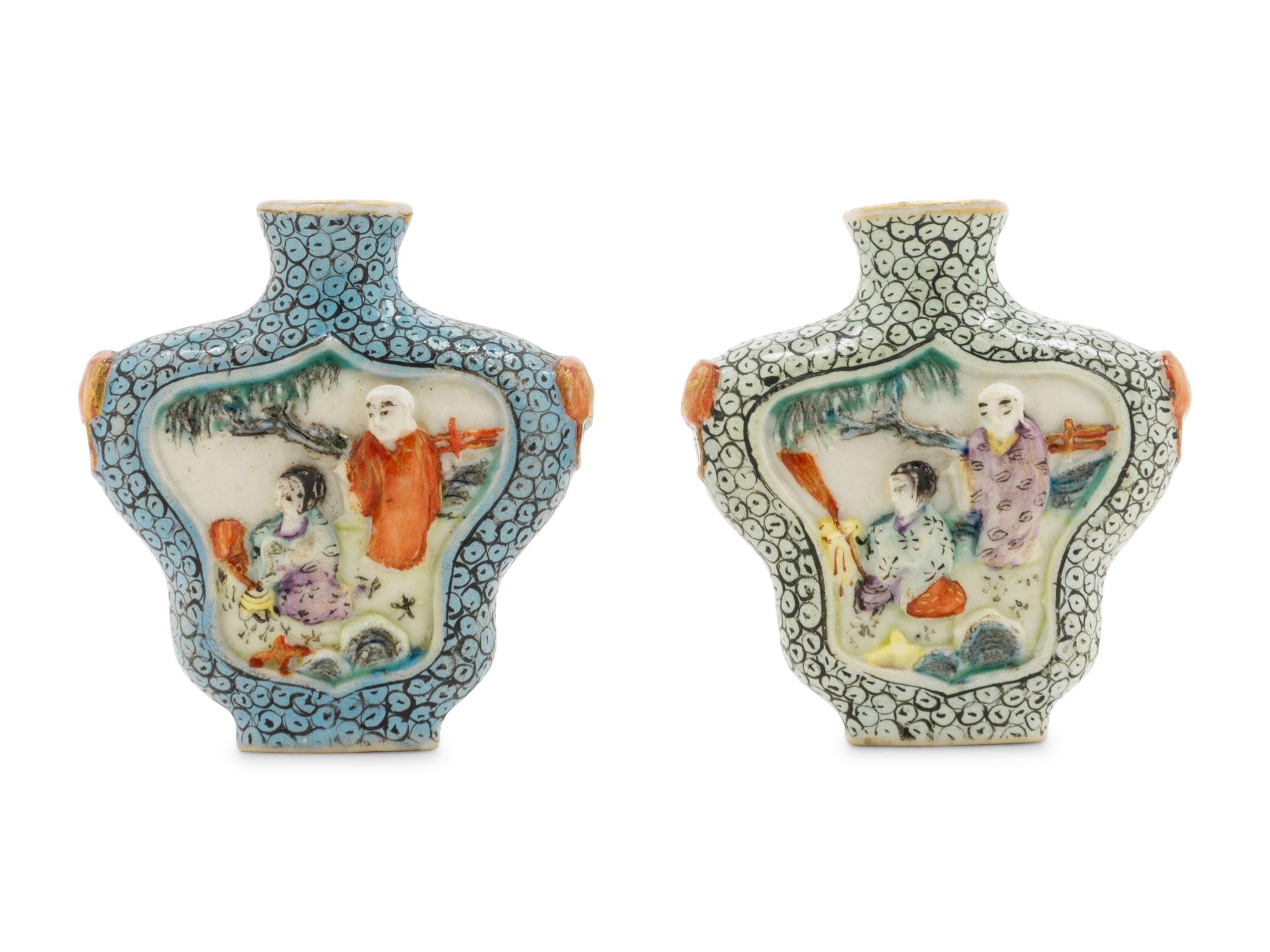 Two Molded Famille Rose Porcelain Snuff Bottles