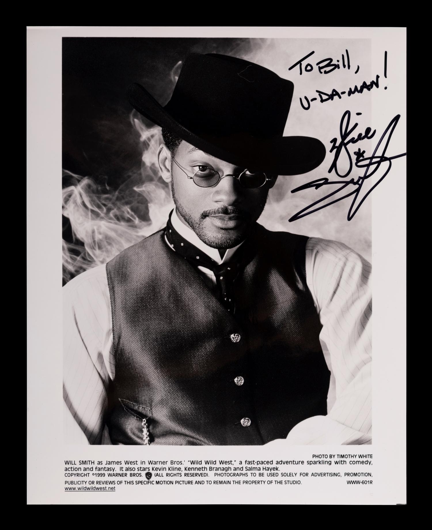 (Celebrity) A group of 20 autographed photographs of celebrities, comprising: