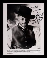 (Celebrity) A group of 20 autographed photographs of celebrities, comprising: