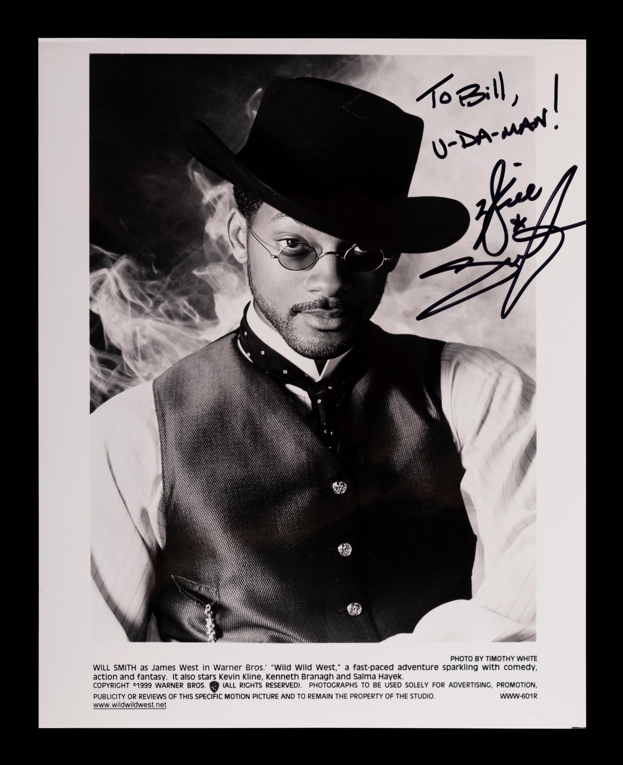 (Celebrity) A group of 20 autographed photographs of celebrities, comprising: