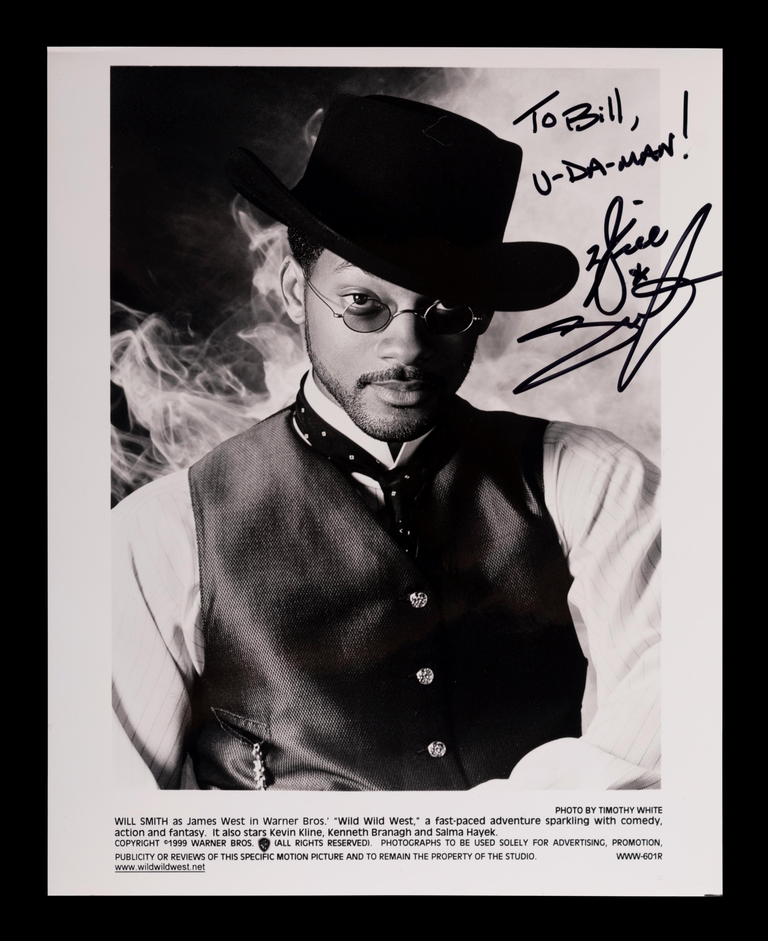 (Celebrity) A group of 20 autographed photographs of celebrities, comprising: