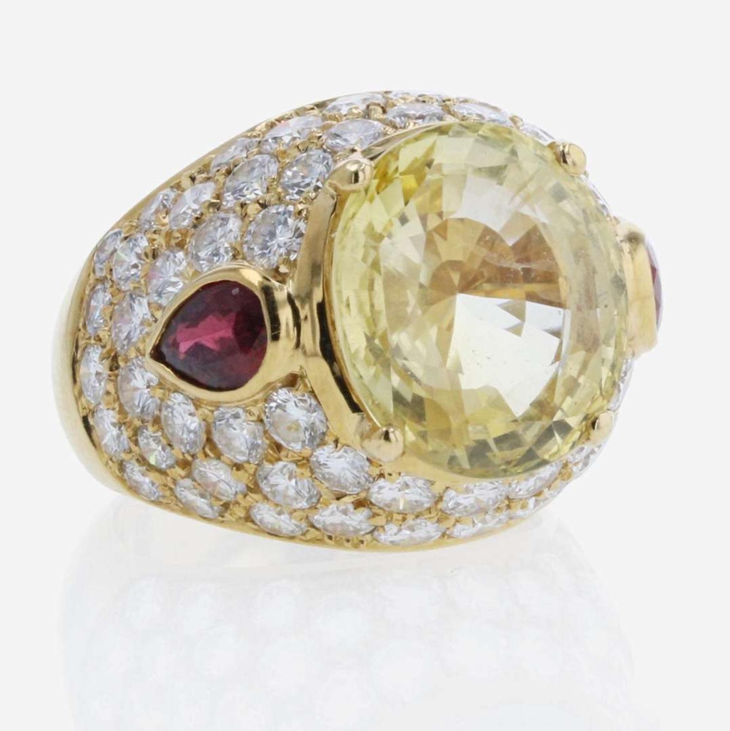 An 18K Yellow Gold and Gemstone Ring