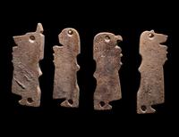 A Set of Four Sons of Horus, Two Scarab Wings, and Two Heads of Horus as a Falcon