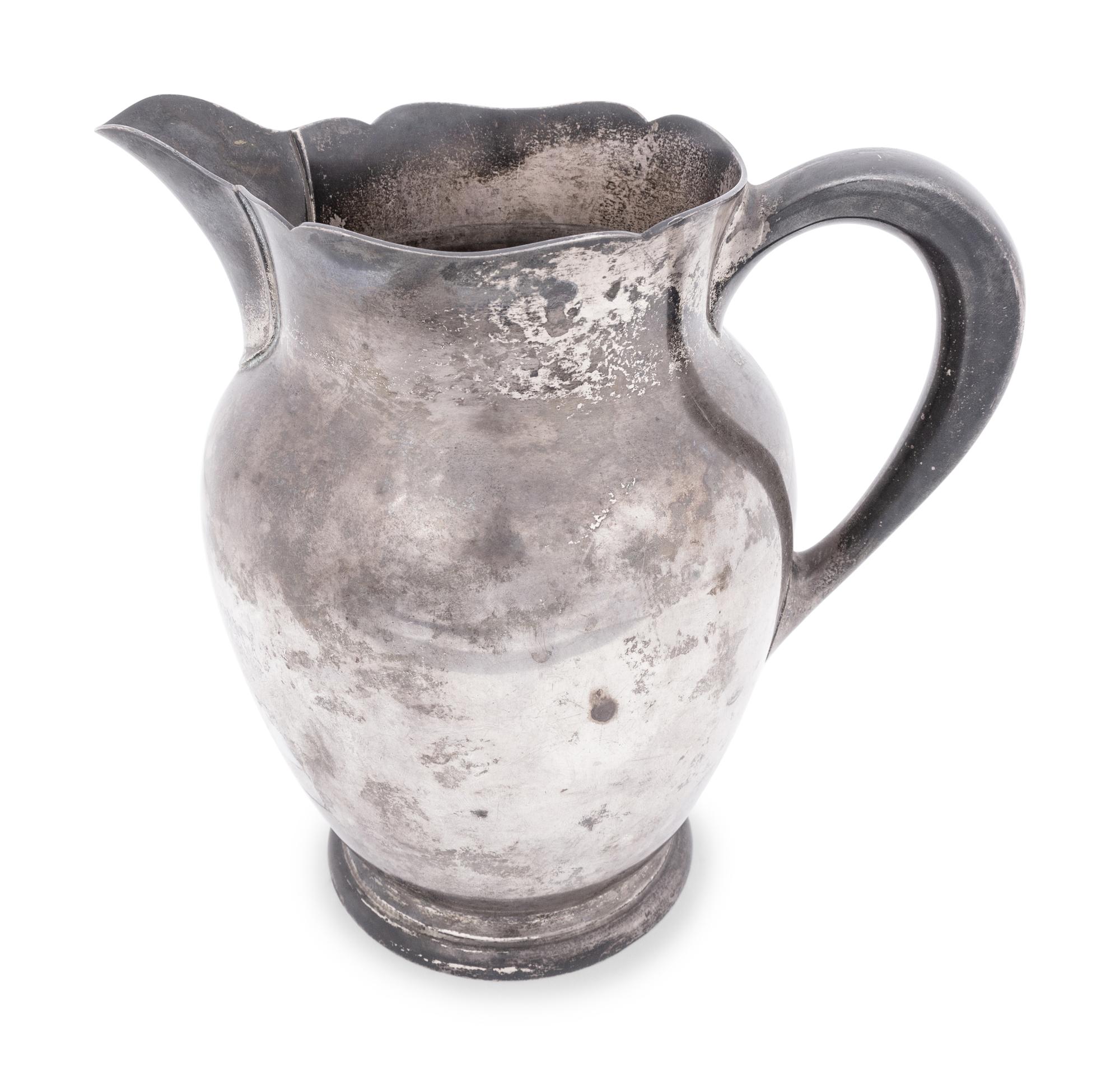 A Kirk and Sons Silver P resentation Pitcher