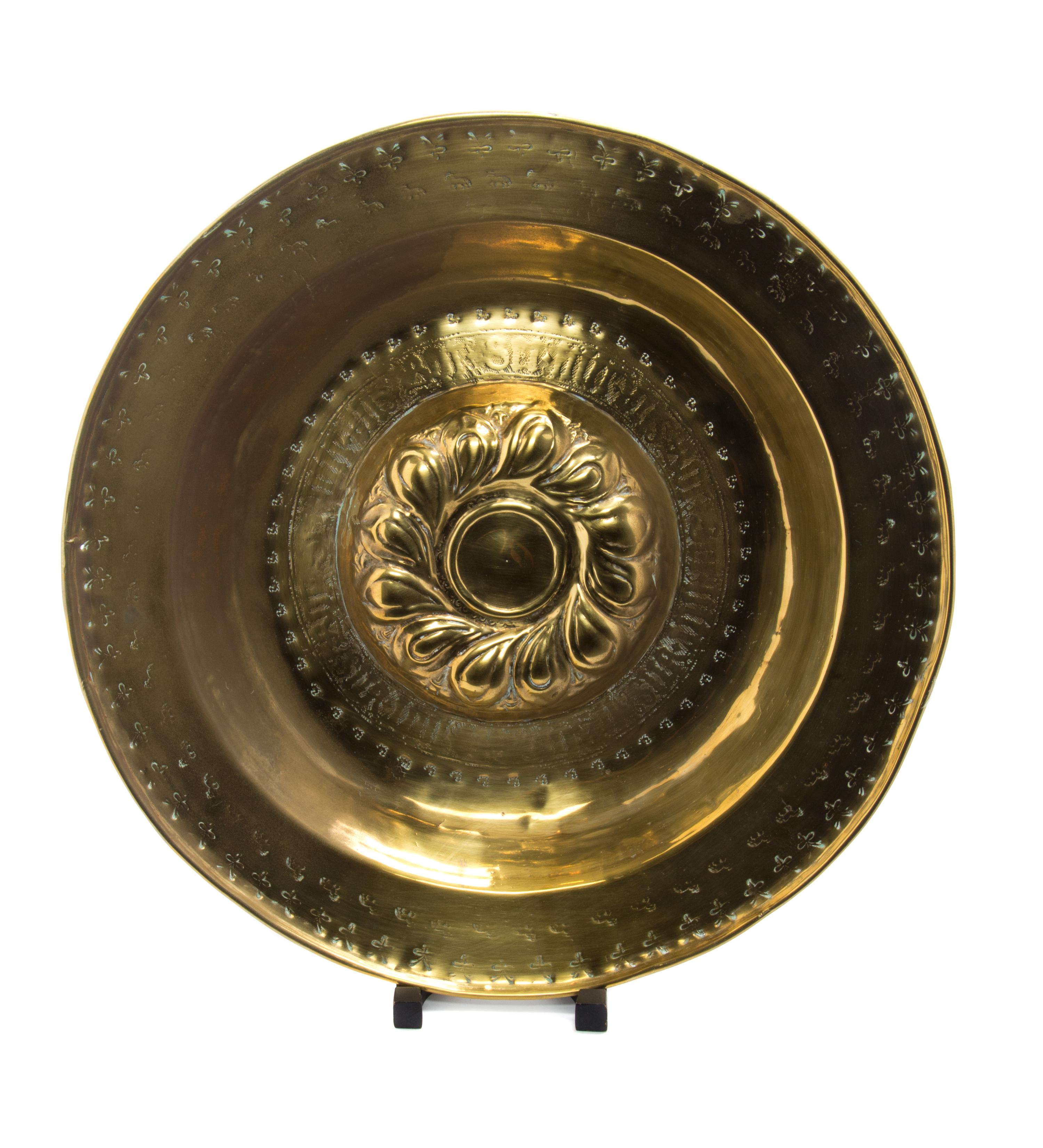 A Pair of Eastern European Brass Chargers Diameter of larger 22 inches. — 19TH CENTURY