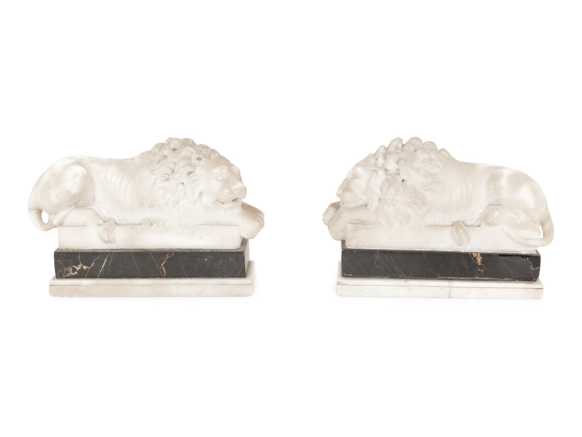 A Pair of Marble Recumbent Lion Bookends